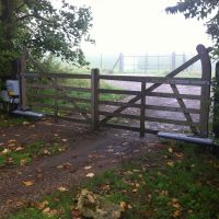 wooden entrance electric gates