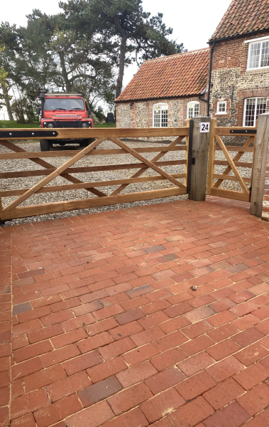 front view of automated gates at a farmhouse in norfolk