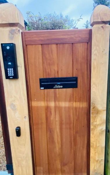 Iroko wood side security entrance gate in Norfolk